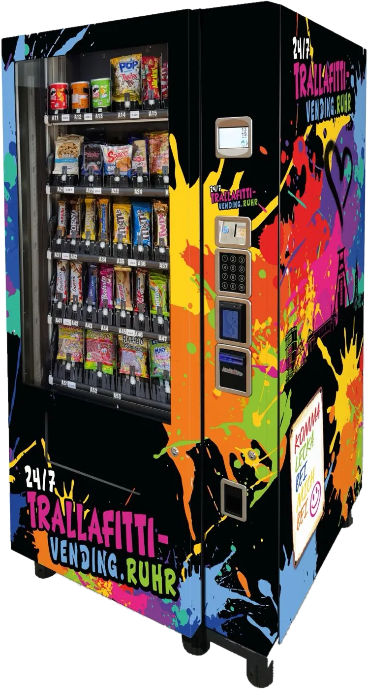 TRALLAFITTI-Automat mit bunter Graffiti-Folierung und der Aufschrift »Komma lecka bei mich bei«, gefüllt mit Snacks